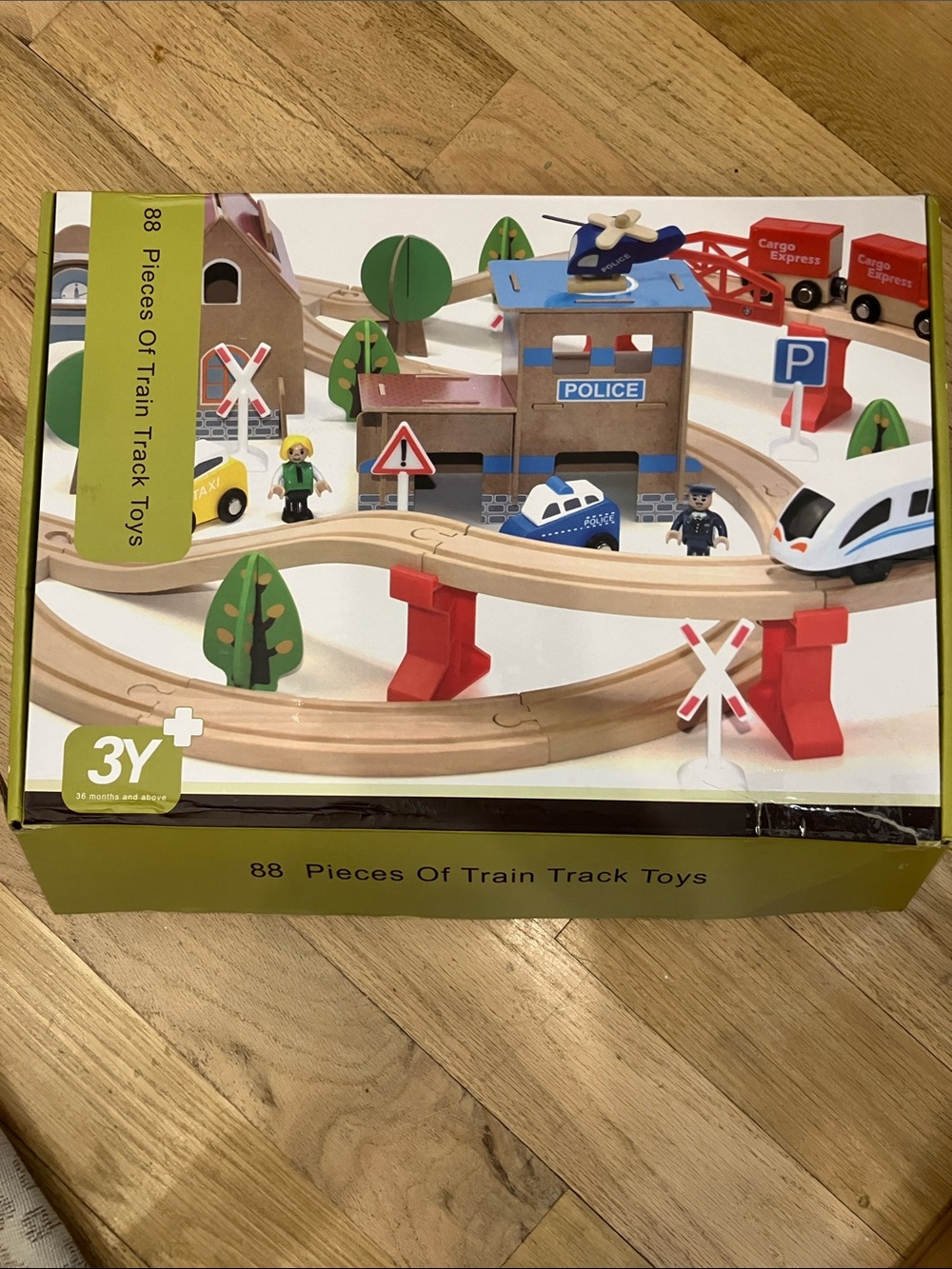 Police Wooden Train Set with Blue, Red, White, Green and Brown Pieces